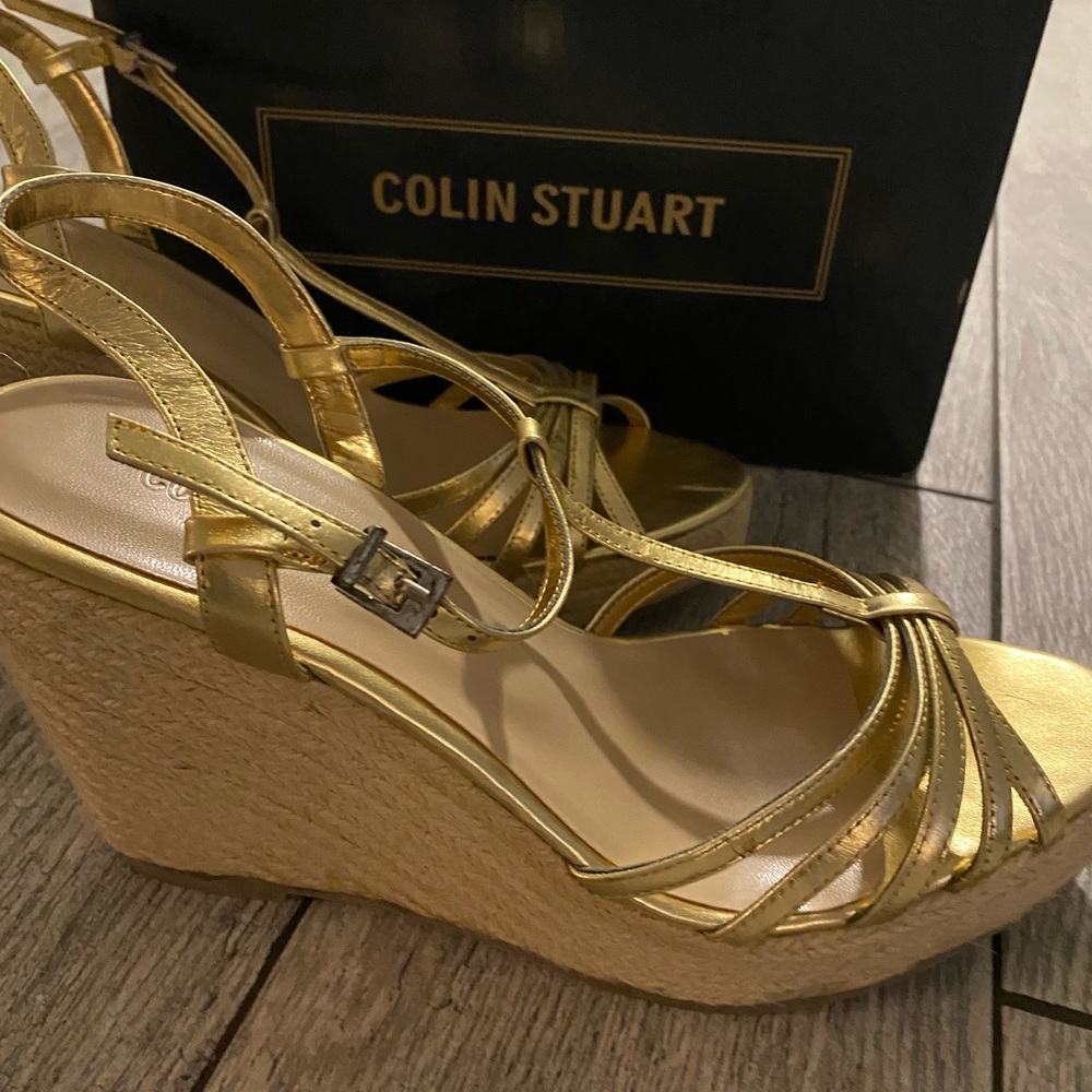 Colin Stuart 
Gold strapped wedges
Brand new in box
Size 10
Never worn